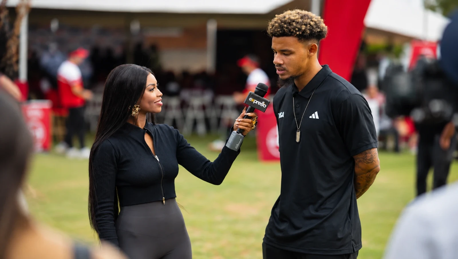 Ayanda G. Thabethe presenting in a television studio